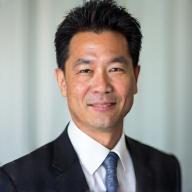 Professional headshot of Mark Chen
